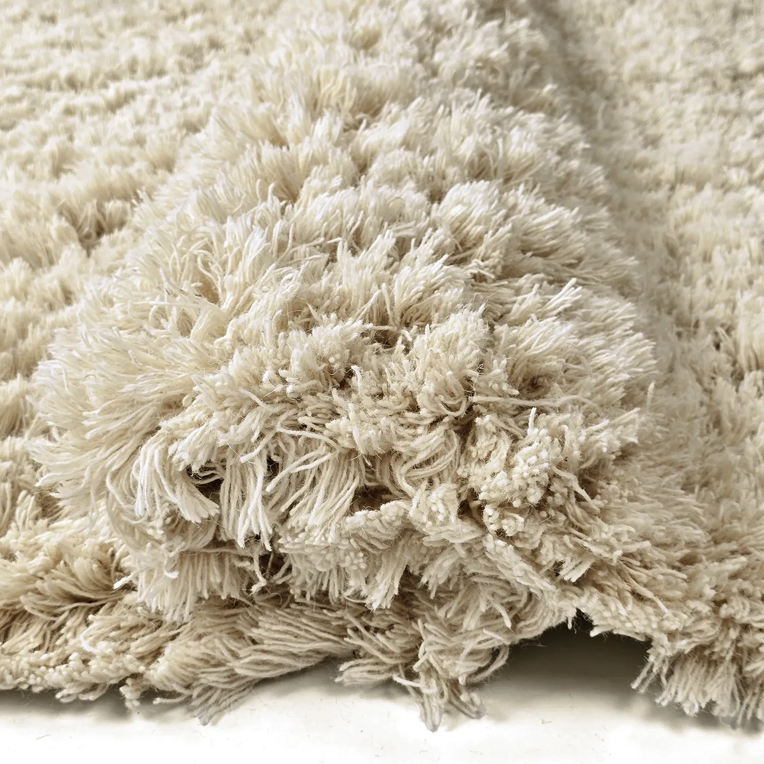 Alfombras de pelo largo - Fassale Hand Woven Wool Shaggy (crema)