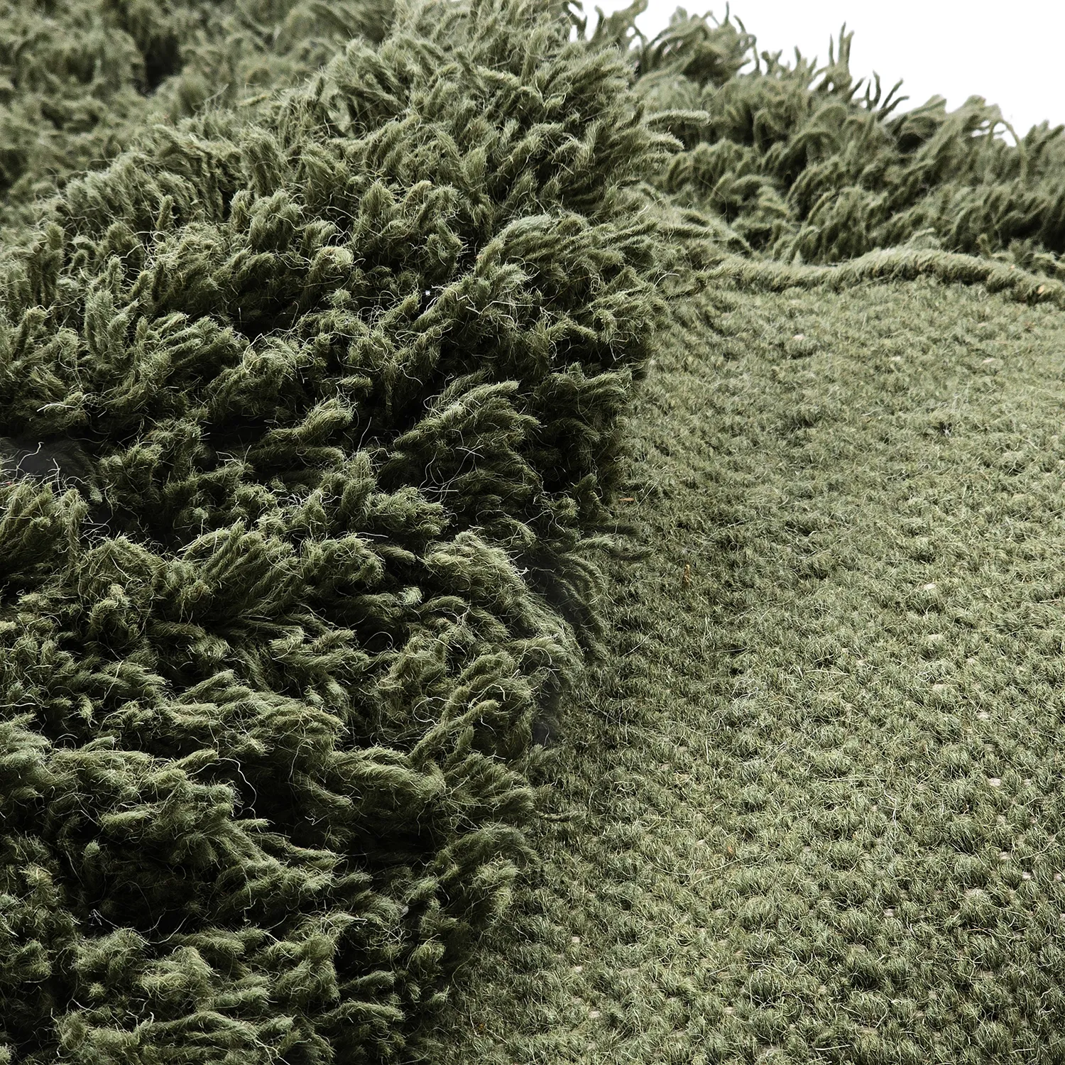 Alfombras redondeadas - Fassale Hand Woven Wool Shaggy (verde musgo)